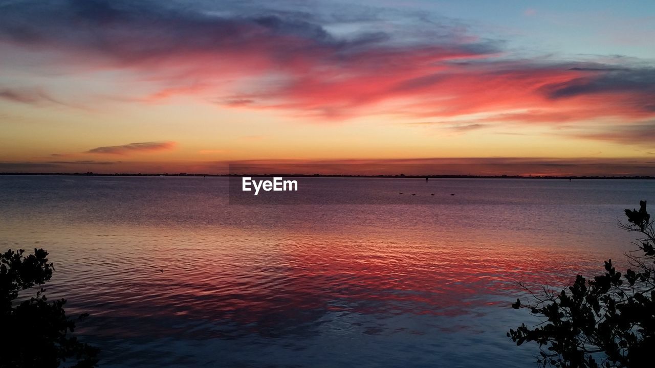 Scenic view of sunset over sea