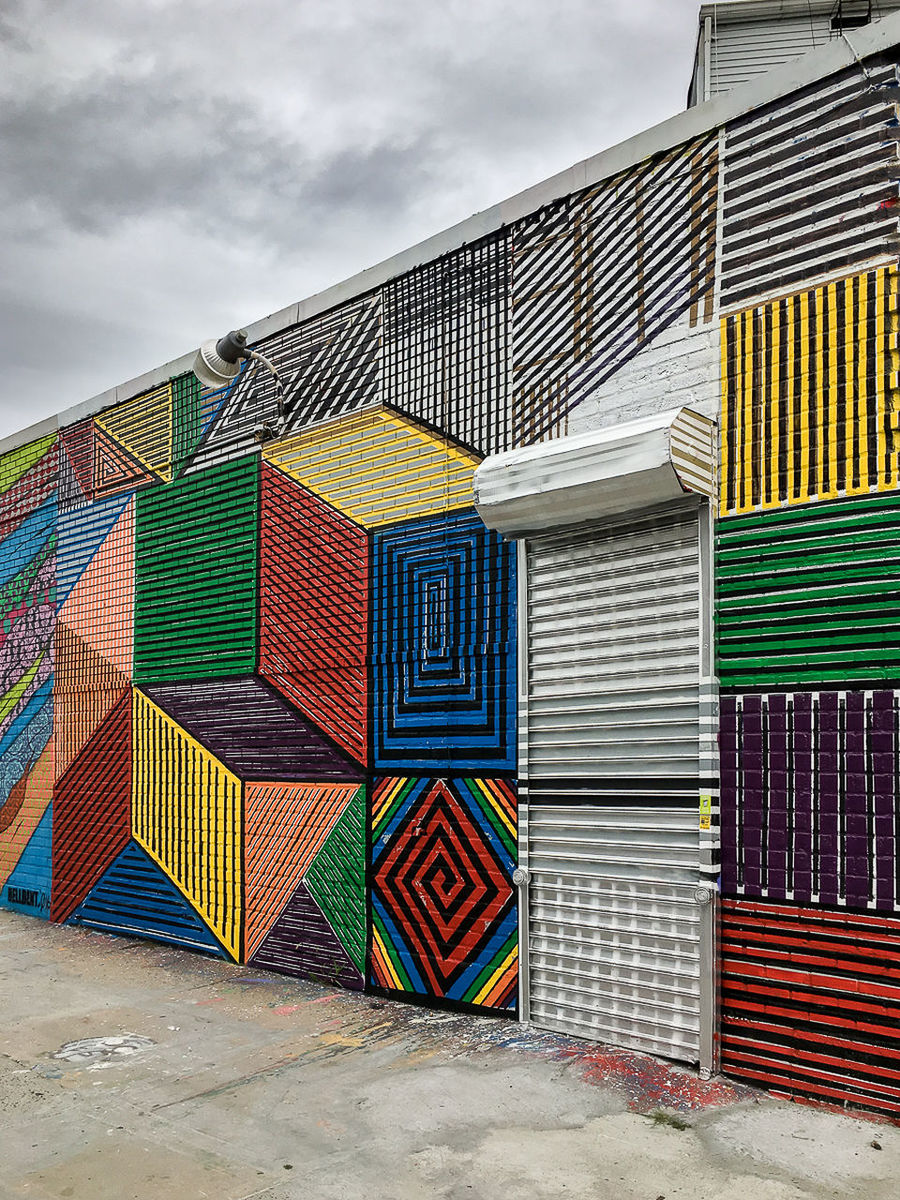 MULTI COLORED WALL AGAINST SKY