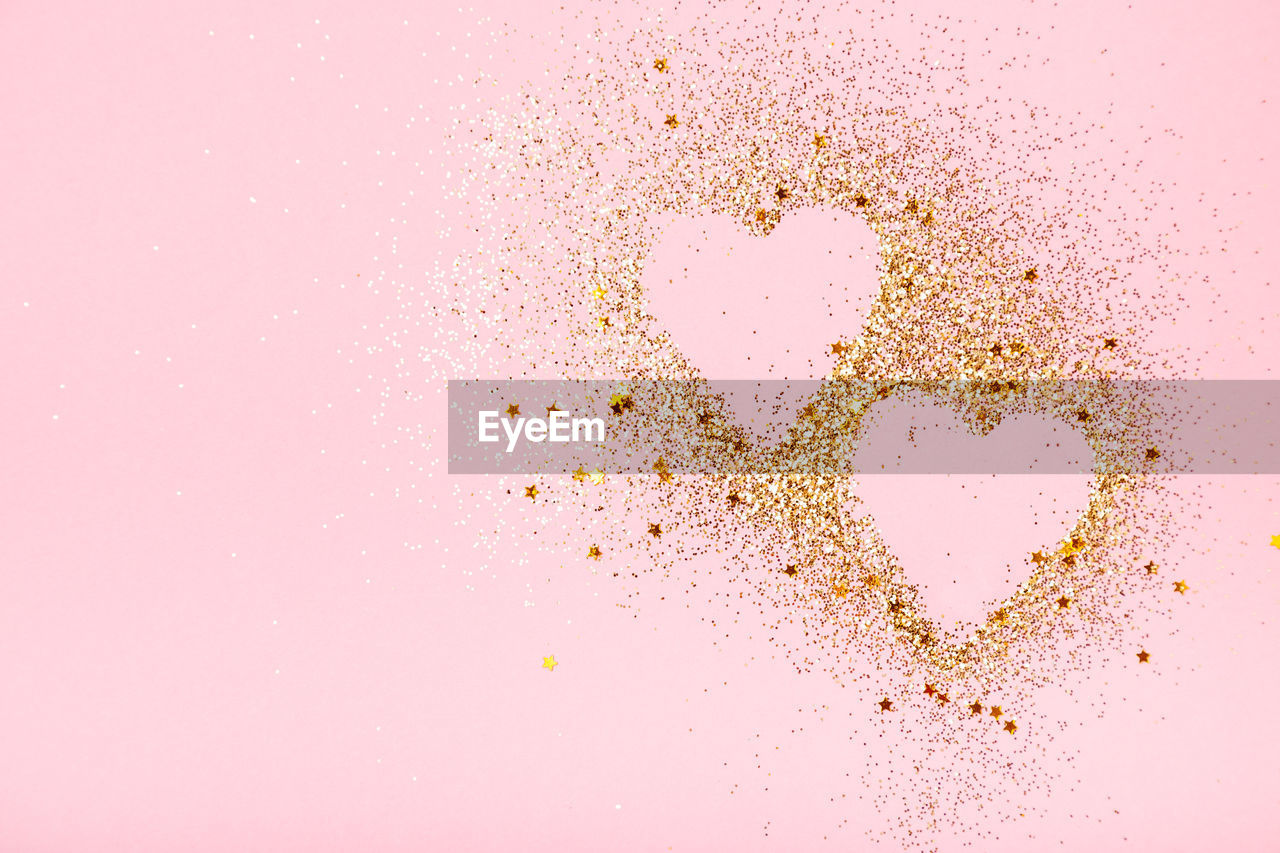 Heart shape over pink background