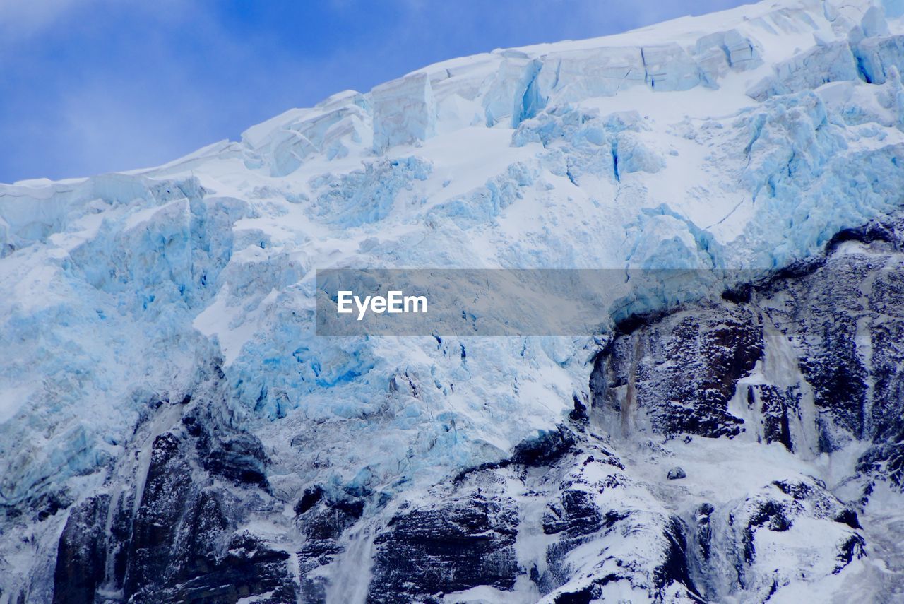 Close-up of glacier against sky