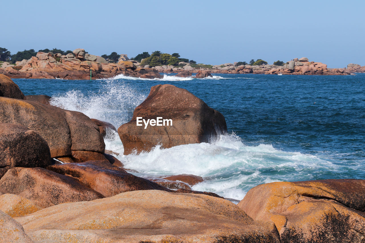 Boulders on the cote de granit rose - pink granite coast, brittany, france