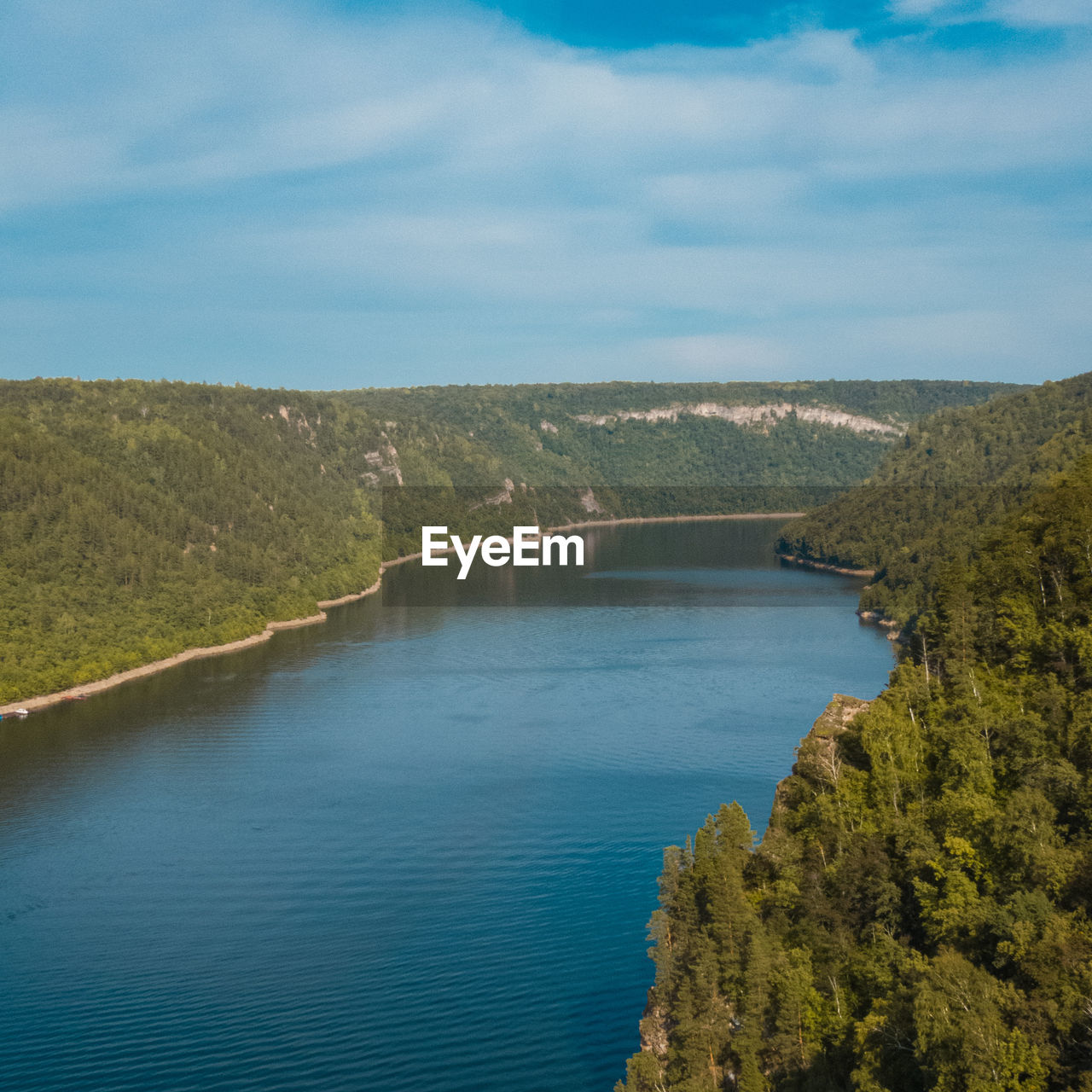 SCENIC VIEW OF RIVER AMIDST LANDSCAPE AGAINST SKY