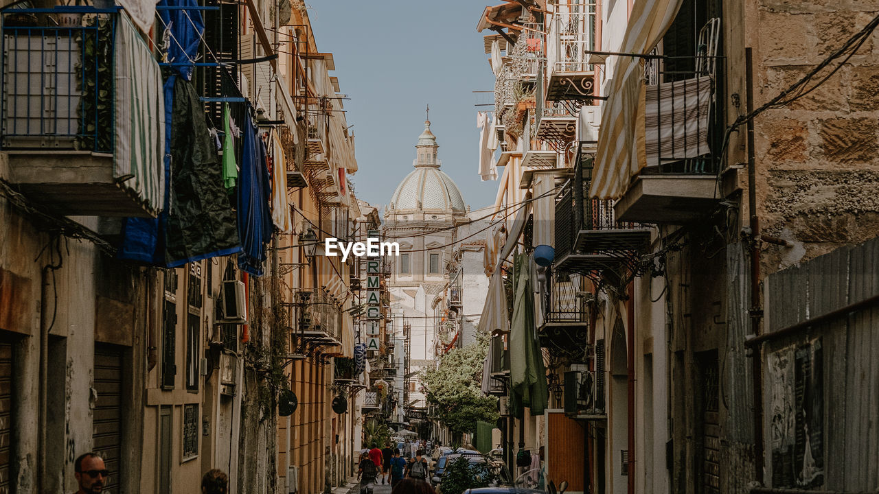 PANORAMIC VIEW OF BUILDINGS AGAINST SKY