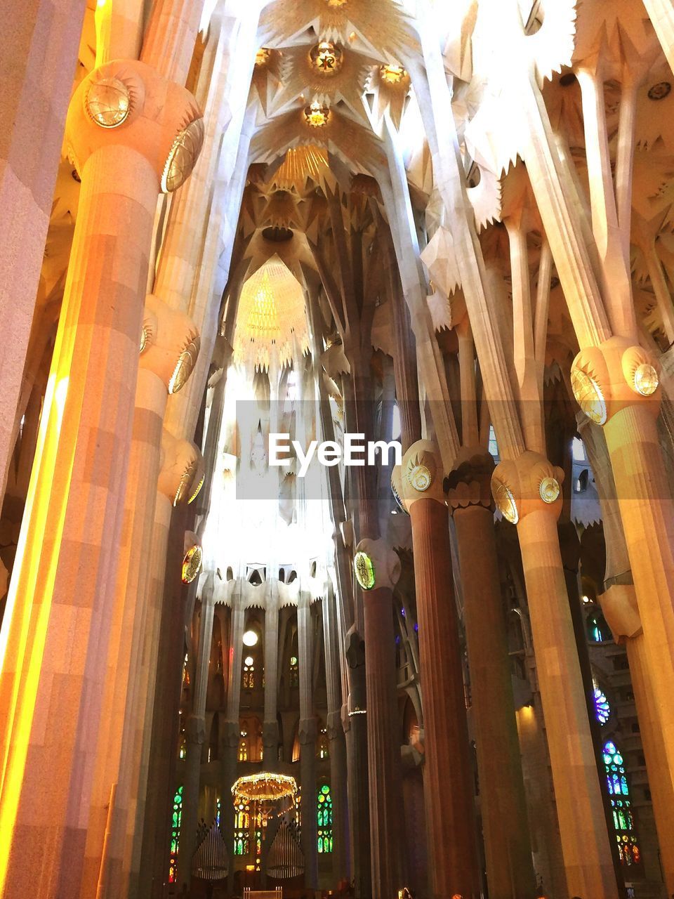 LOW ANGLE VIEW OF ILLUMINATED CHURCH AT NIGHT