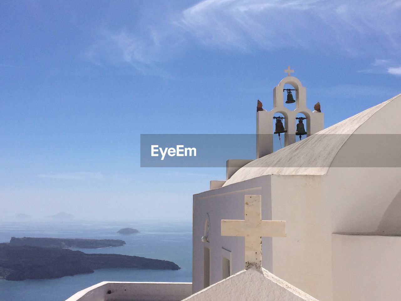 White church in imerovigli at santorini against sky
