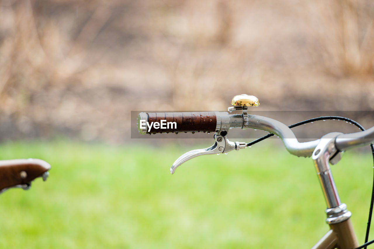 Close-up of wet bicycle during monsoon