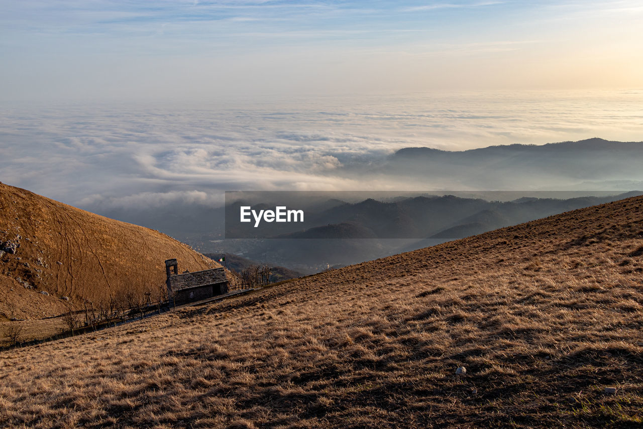 Scenic view of landscape against sky during sunset