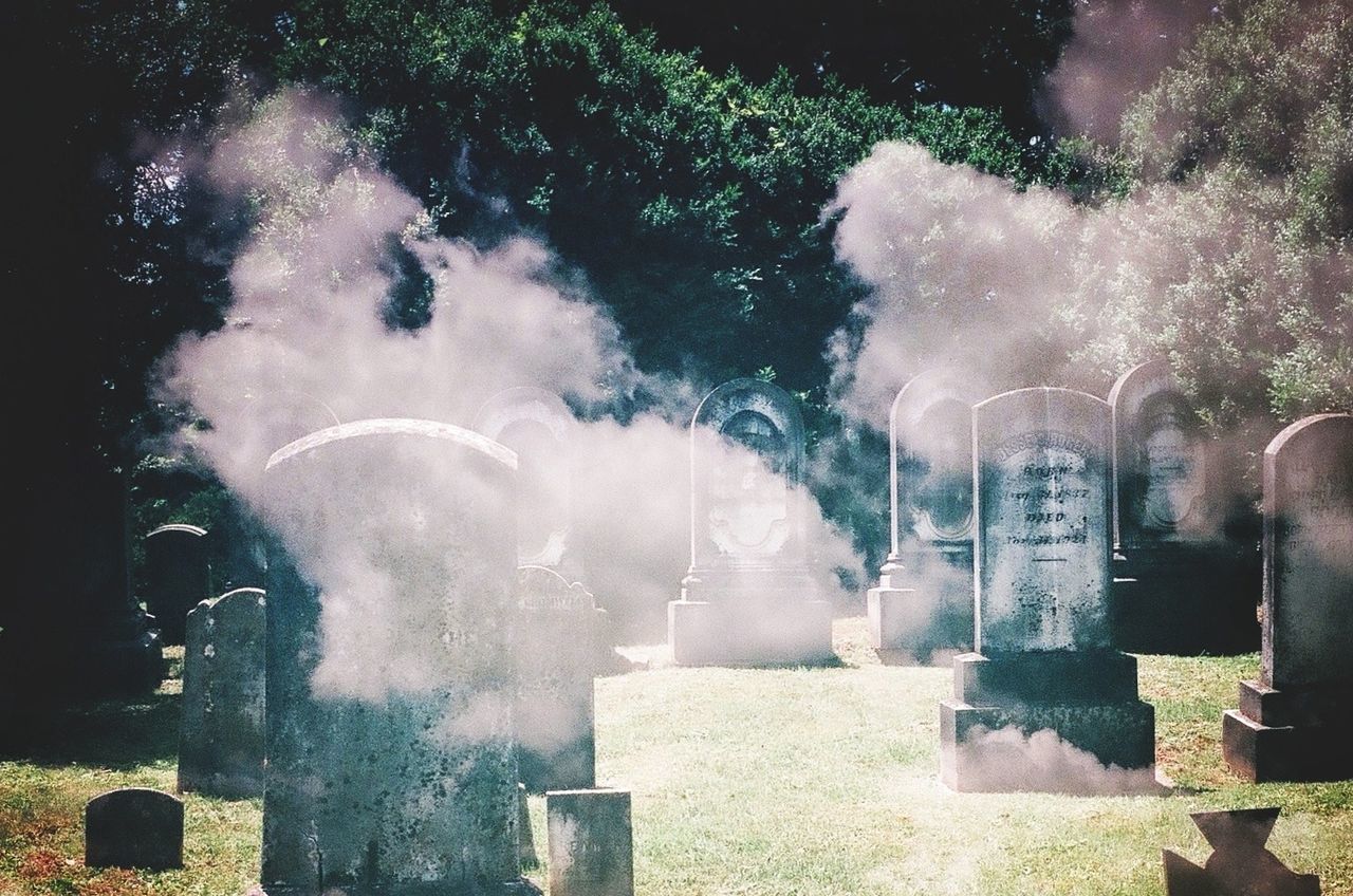 Reflection of clouds and gravestones