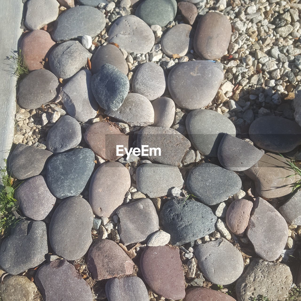 HIGH ANGLE VIEW OF STONES ON STONE