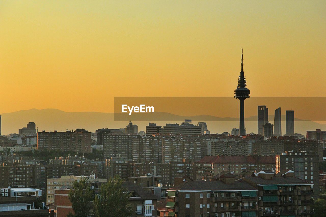 High angle shot of cityscape against clear sky