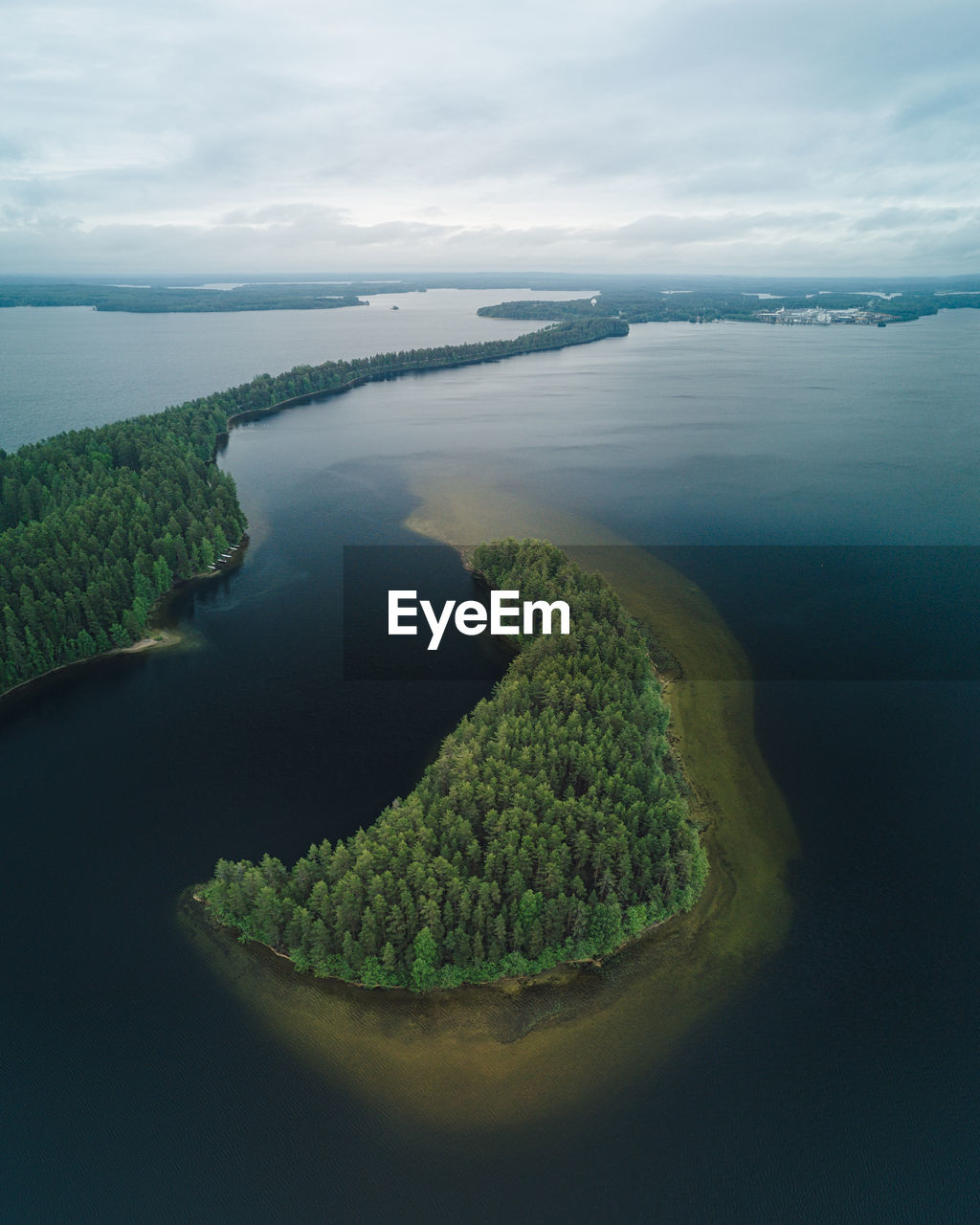 An island above the punkaharju ridge in savonlinna, finland.