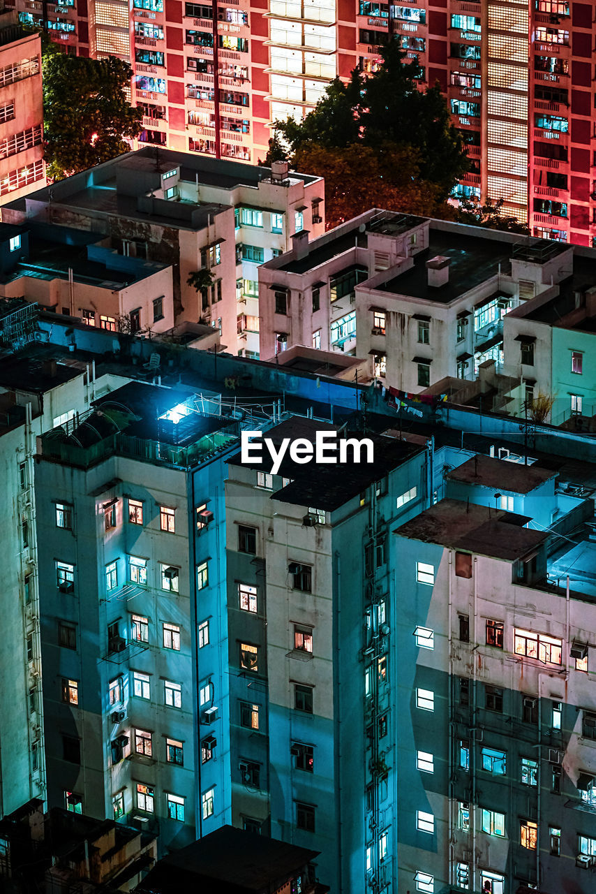 High angle view of illuminated buildings at night