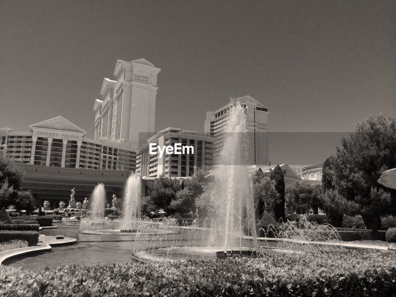 FOUNTAIN IN FRONT OF BUILDINGS