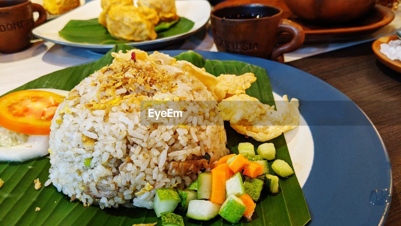 Close-up of indonesia fried rice in plate on table