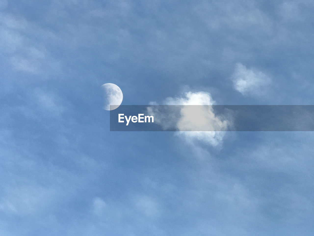 LOW ANGLE VIEW OF MOON AGAINST SKY