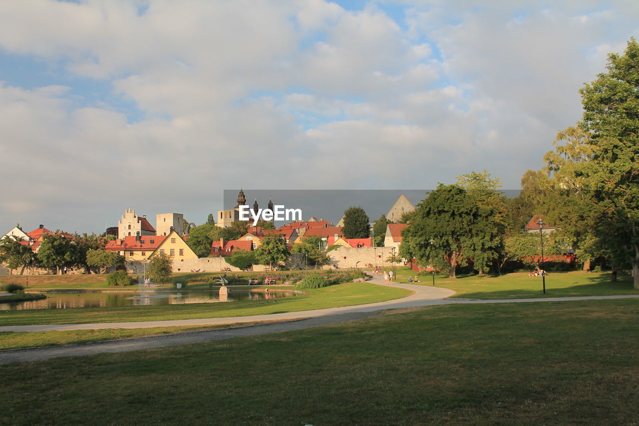 Scenic view of almedalen park against cloudy sky