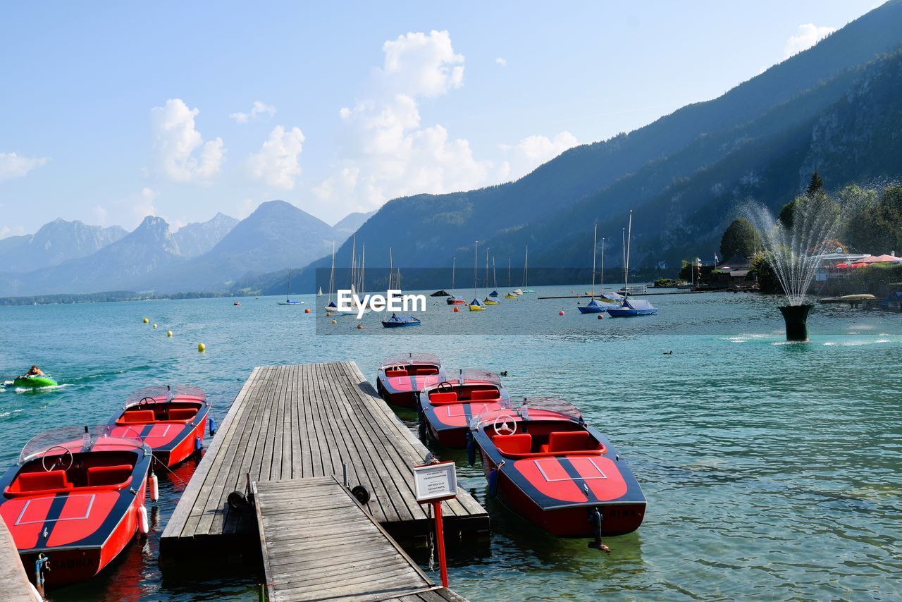 Scenic view of the sea and mountains against the sky