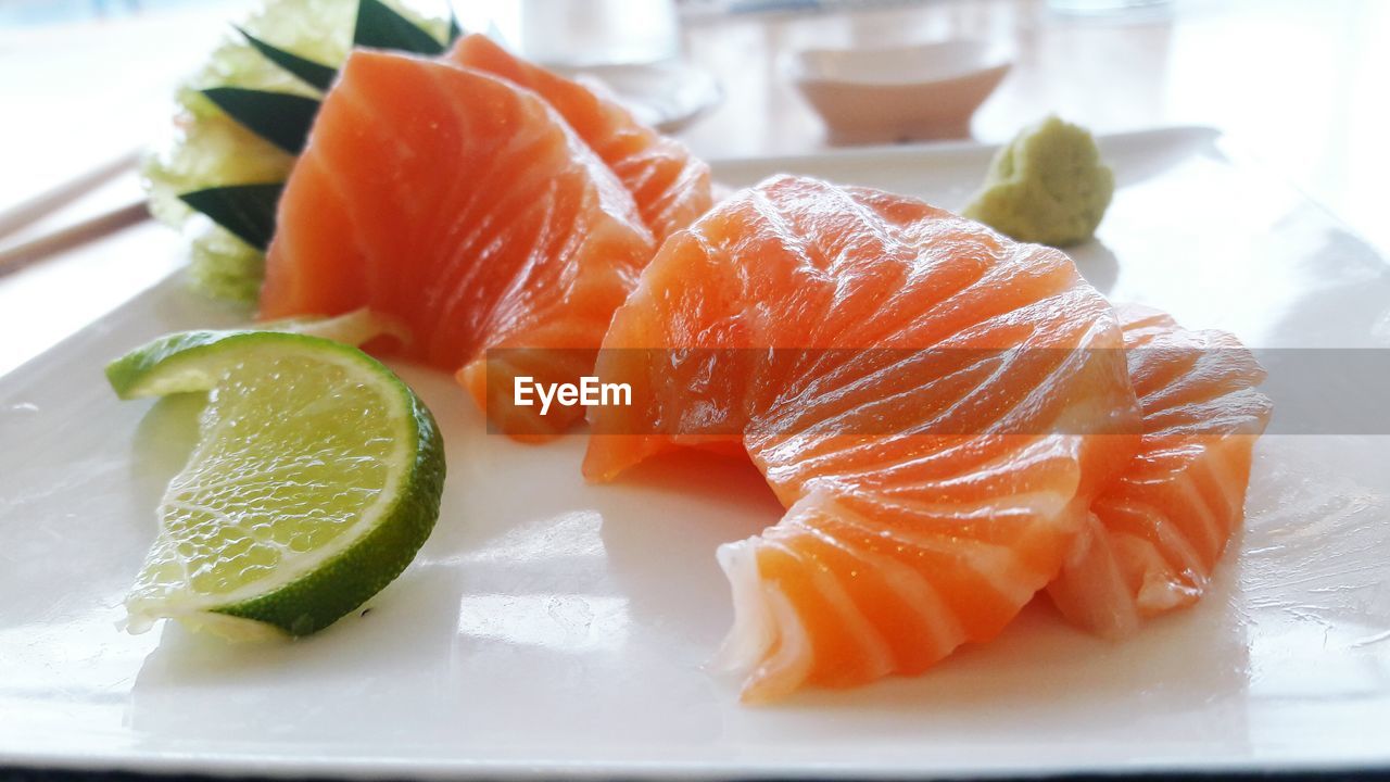 CLOSE-UP OF SUSHI SERVED ON PLATE