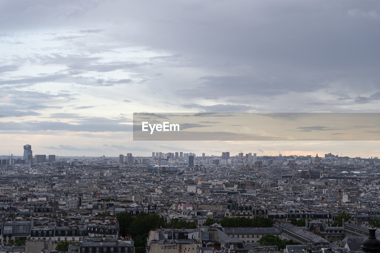 High angle view of cityscape against sky during sunset