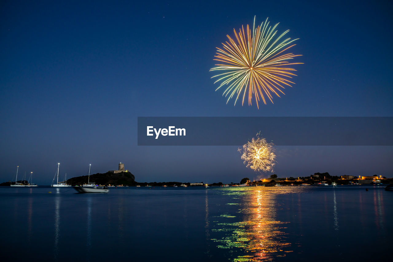 Fireworks over the sea of nora bay, sardinia