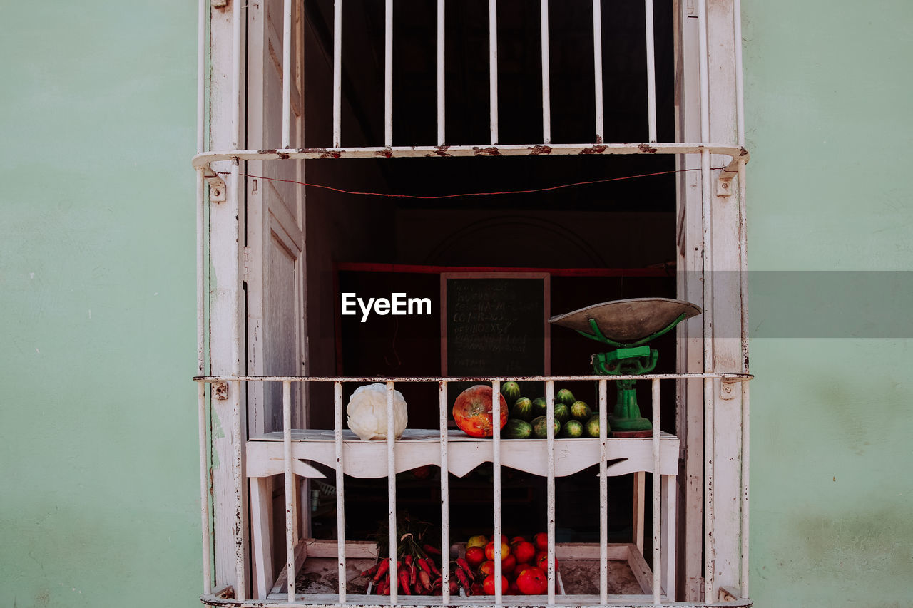 Green grocery selling fresh fruit and vegetables on stall