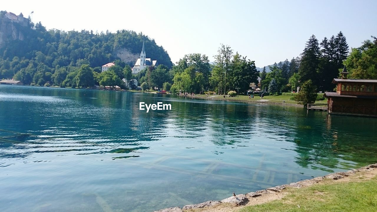 Village on of scenic mountain lake shore