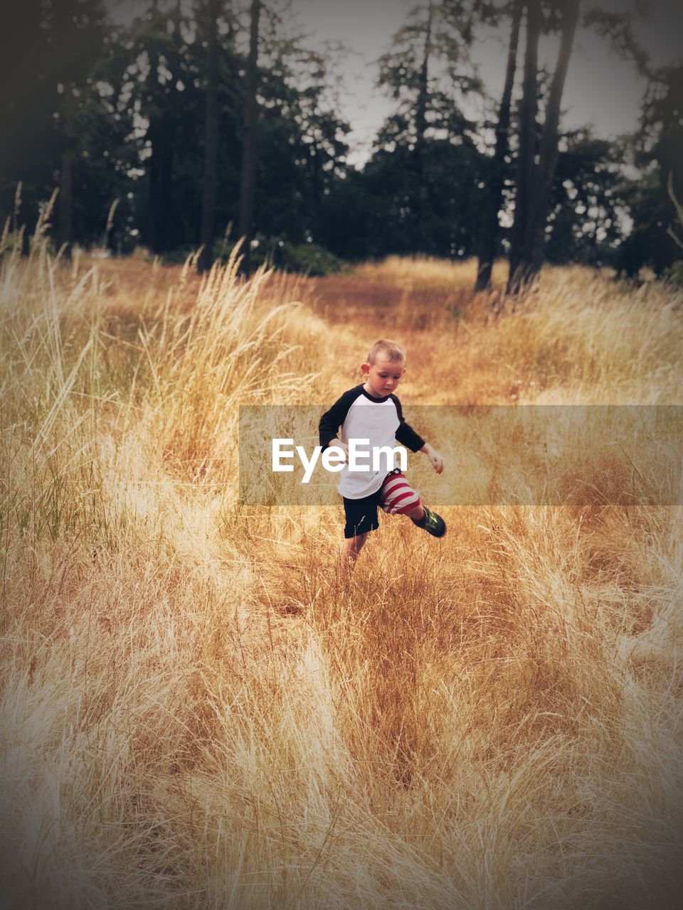 Boy running on field