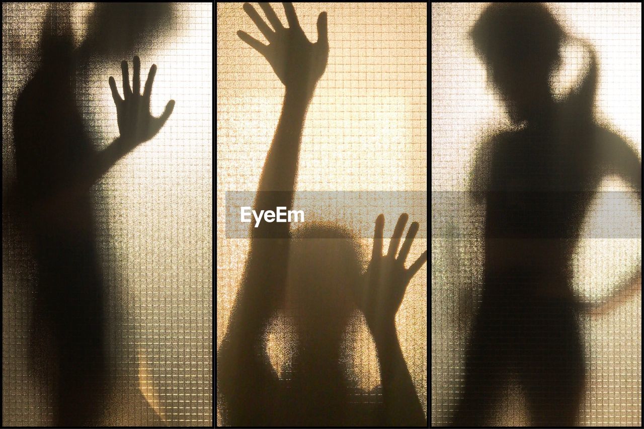 Silhouette women seen through window