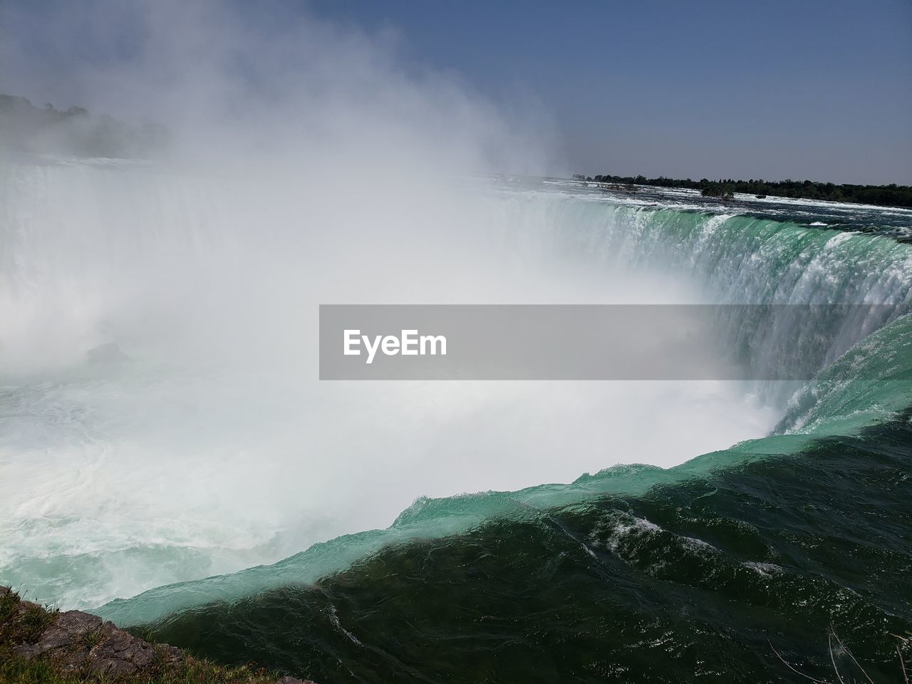 SCENIC VIEW OF WATERFALL