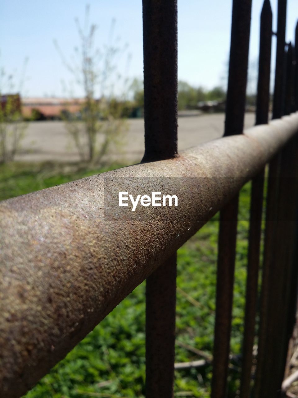 CLOSE-UP OF METALLIC FENCE