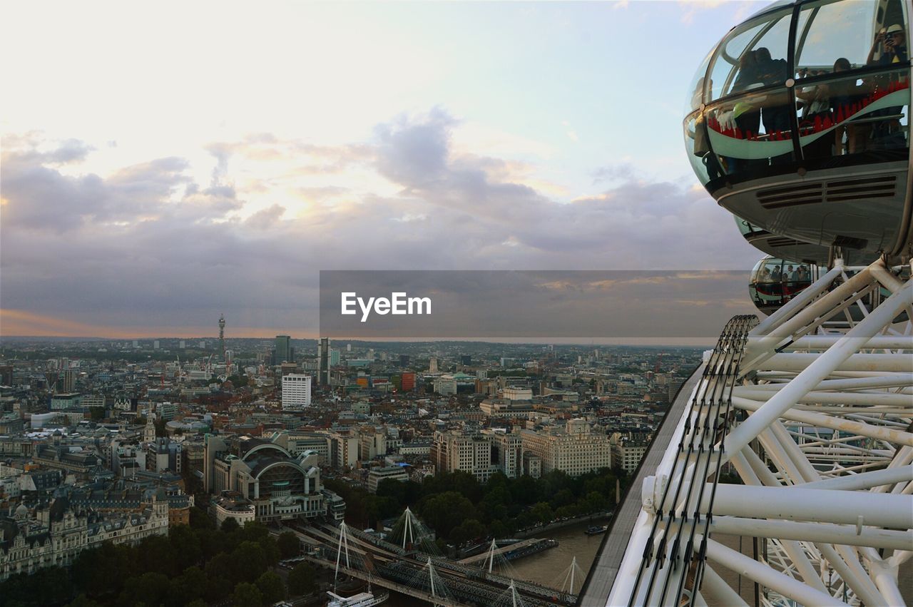 Cityscape seen from millennium wheel against sky