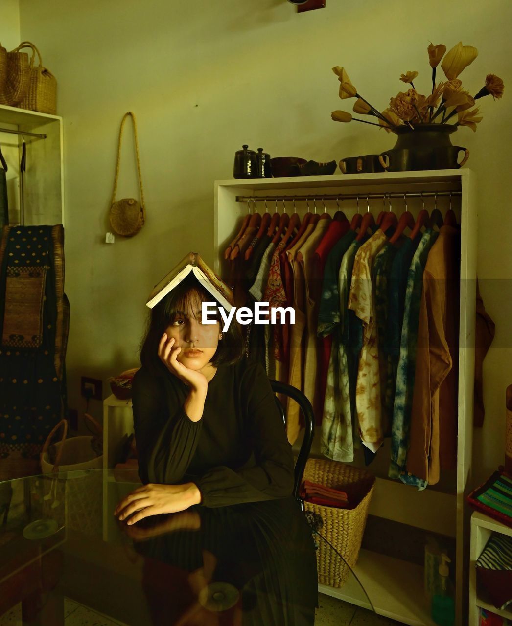 Portrait of woman standing in store