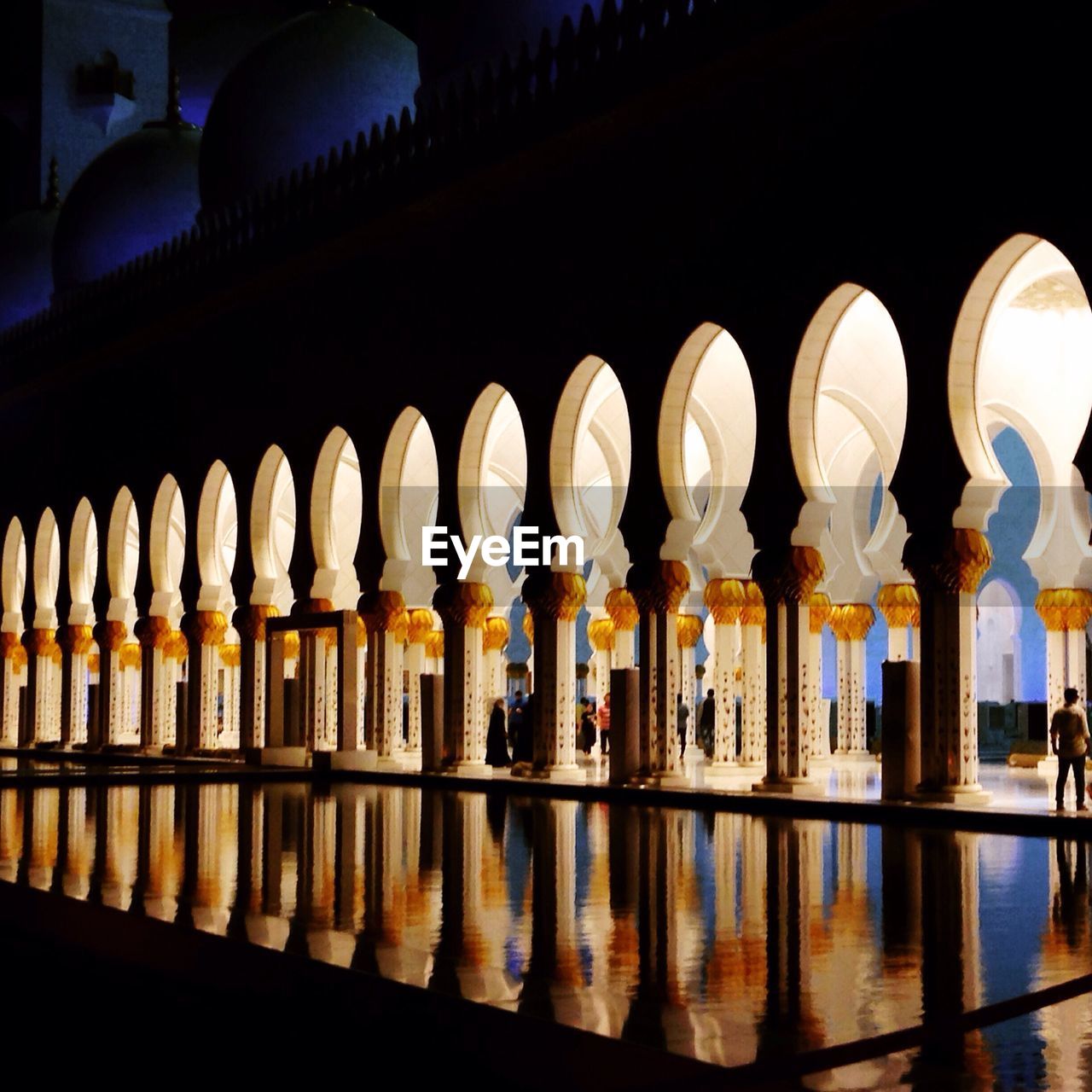 Reflection of illuminated lights in building