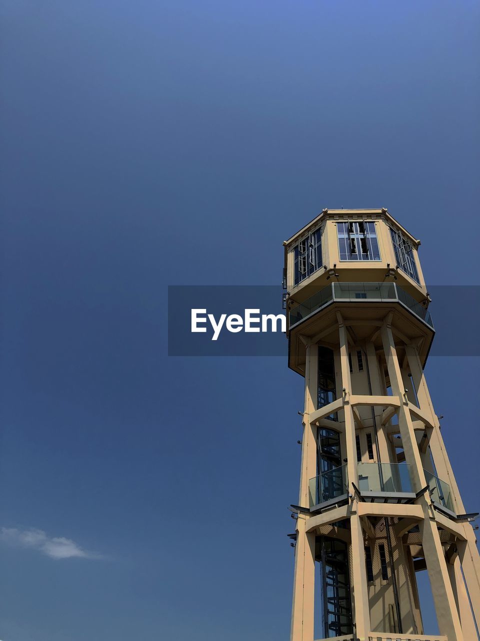 Low angle view of water tower in siófok against sky