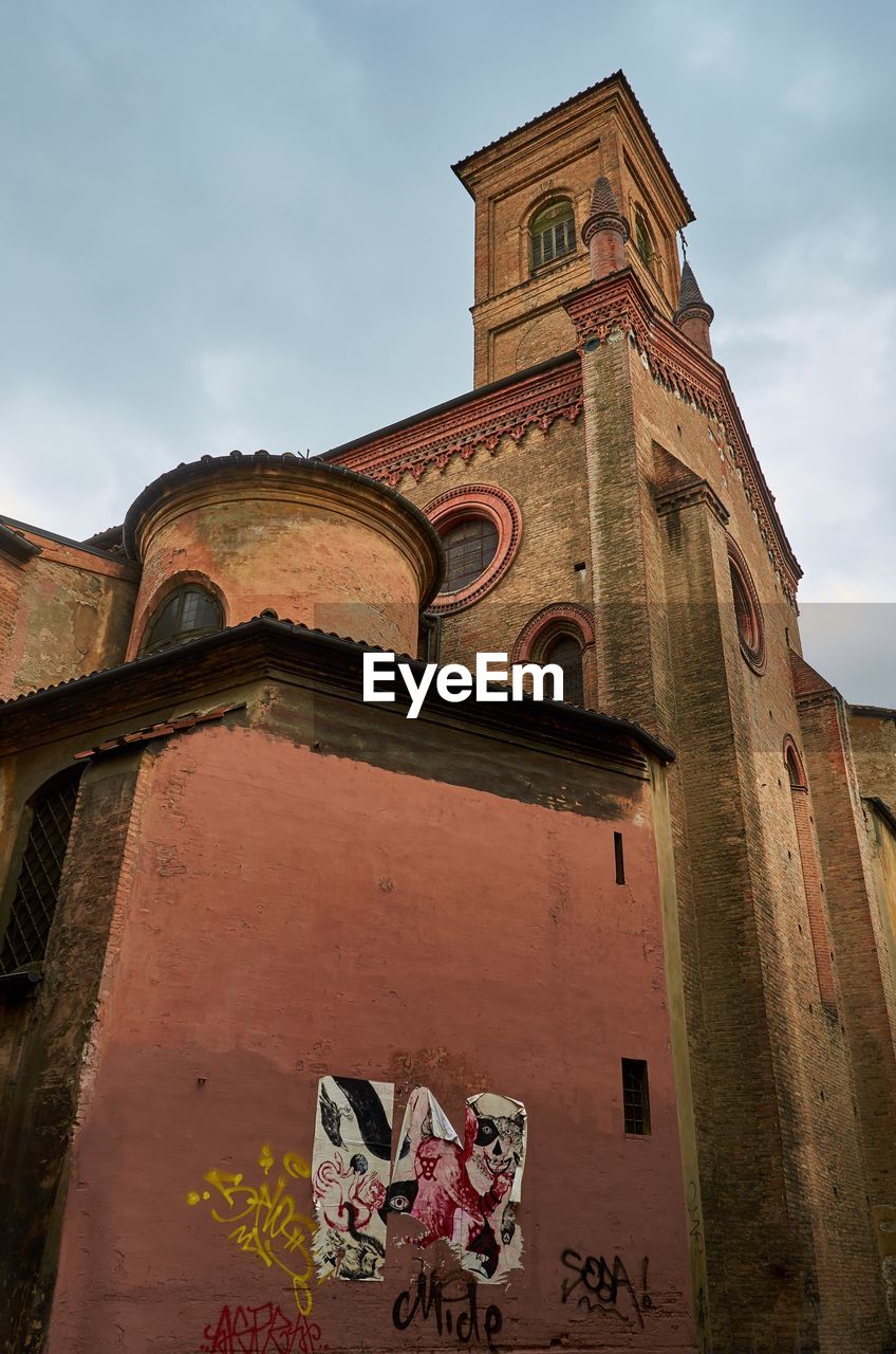 LOW ANGLE VIEW OF A CLOCK TOWER