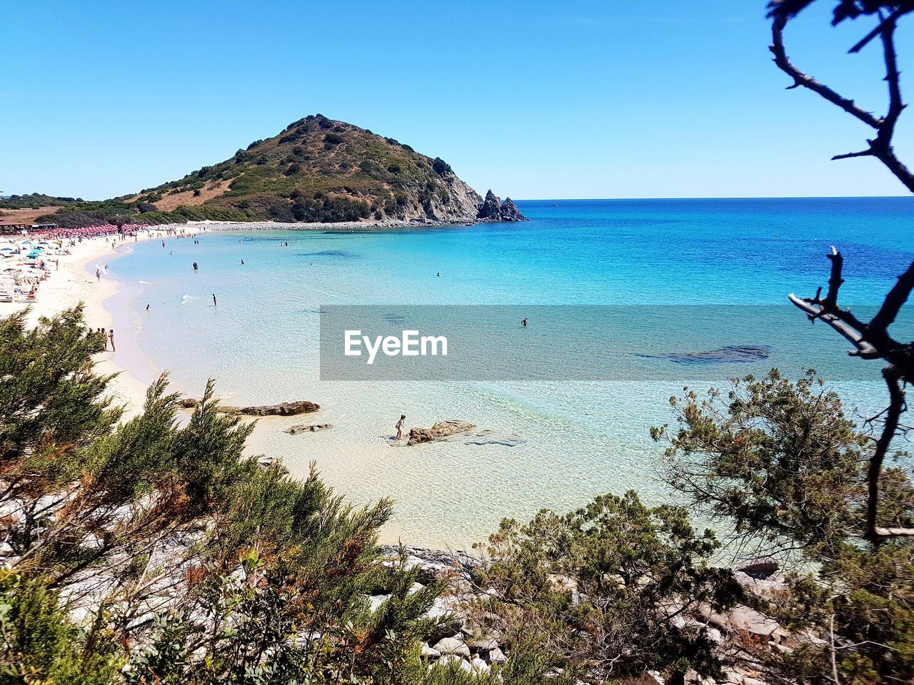 Scenic view of sea against clear blue sky