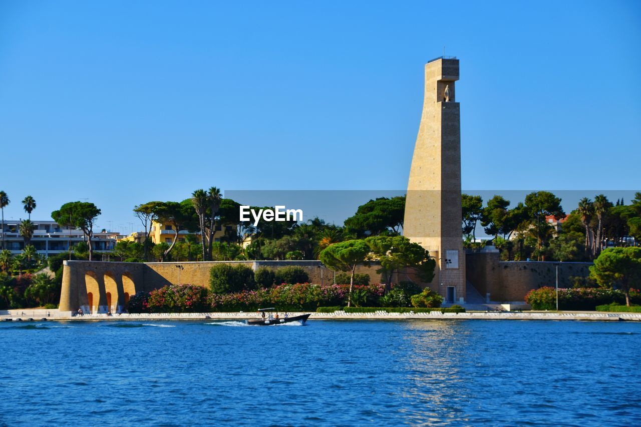 View of castle against clear blue sky