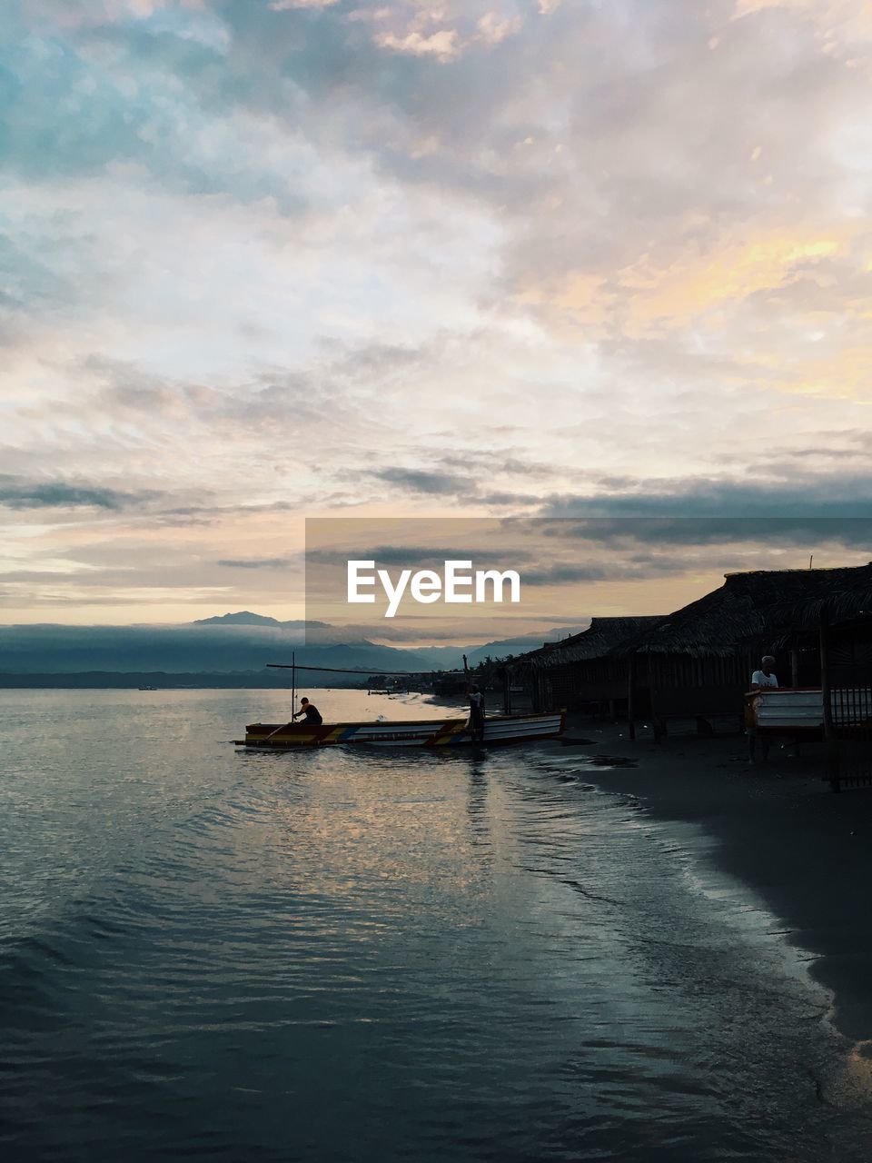 VIEW OF CALM SEA AGAINST SCENIC SKY