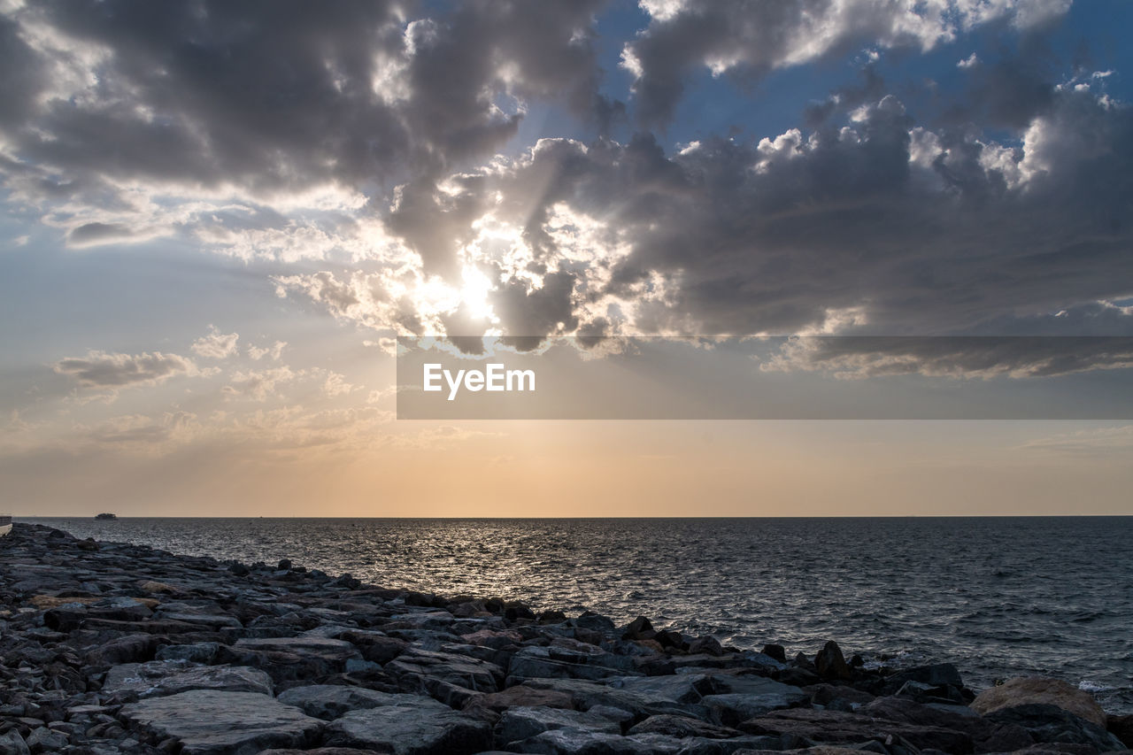 Scenic view of sea against sky during sunset
