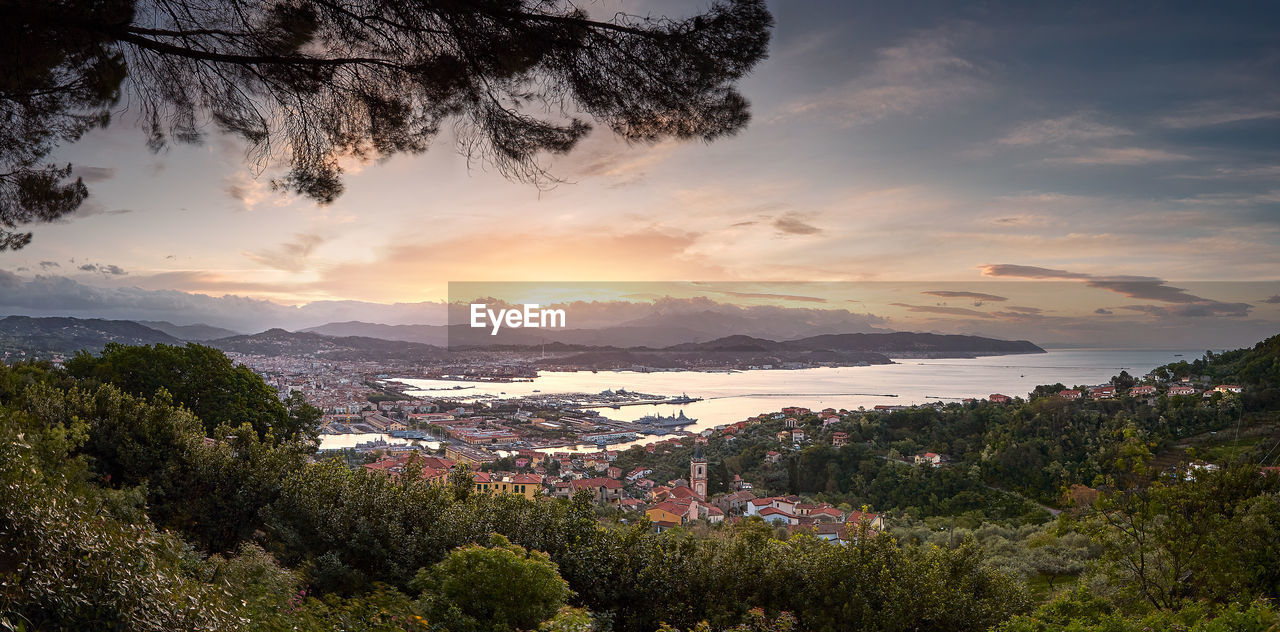 High angle view of townscape at sunset