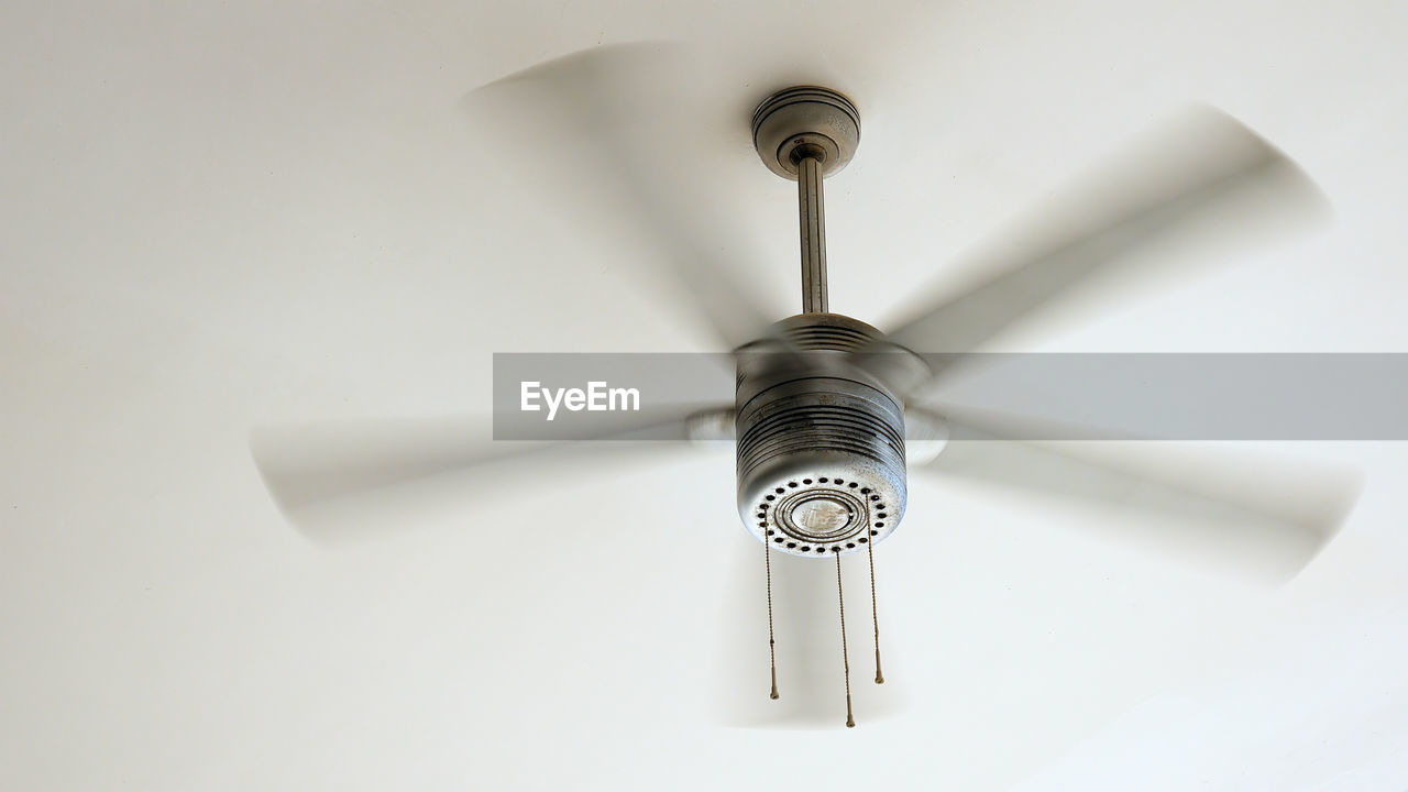 Low angle view of ceiling fan