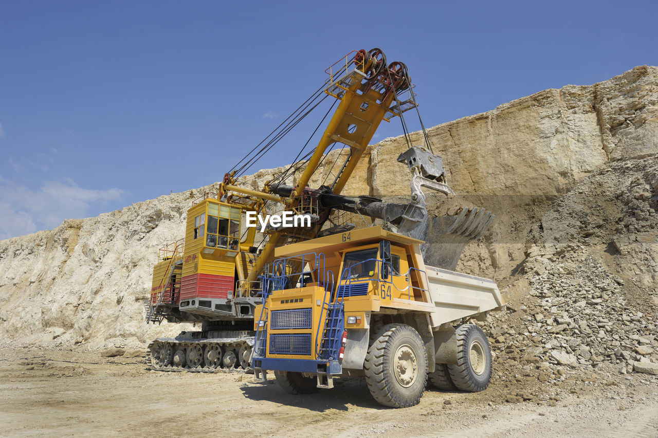 Earth mover working at quarry