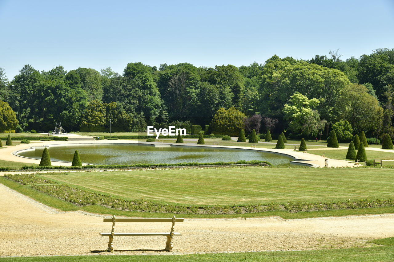 Scenic view of park against clear sky