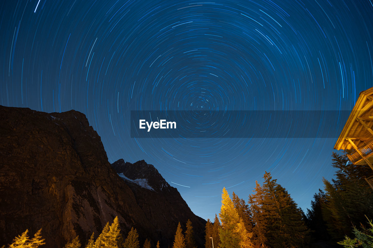 Star trails from la fouly in switzerland with a fantastic view of the swiss alps