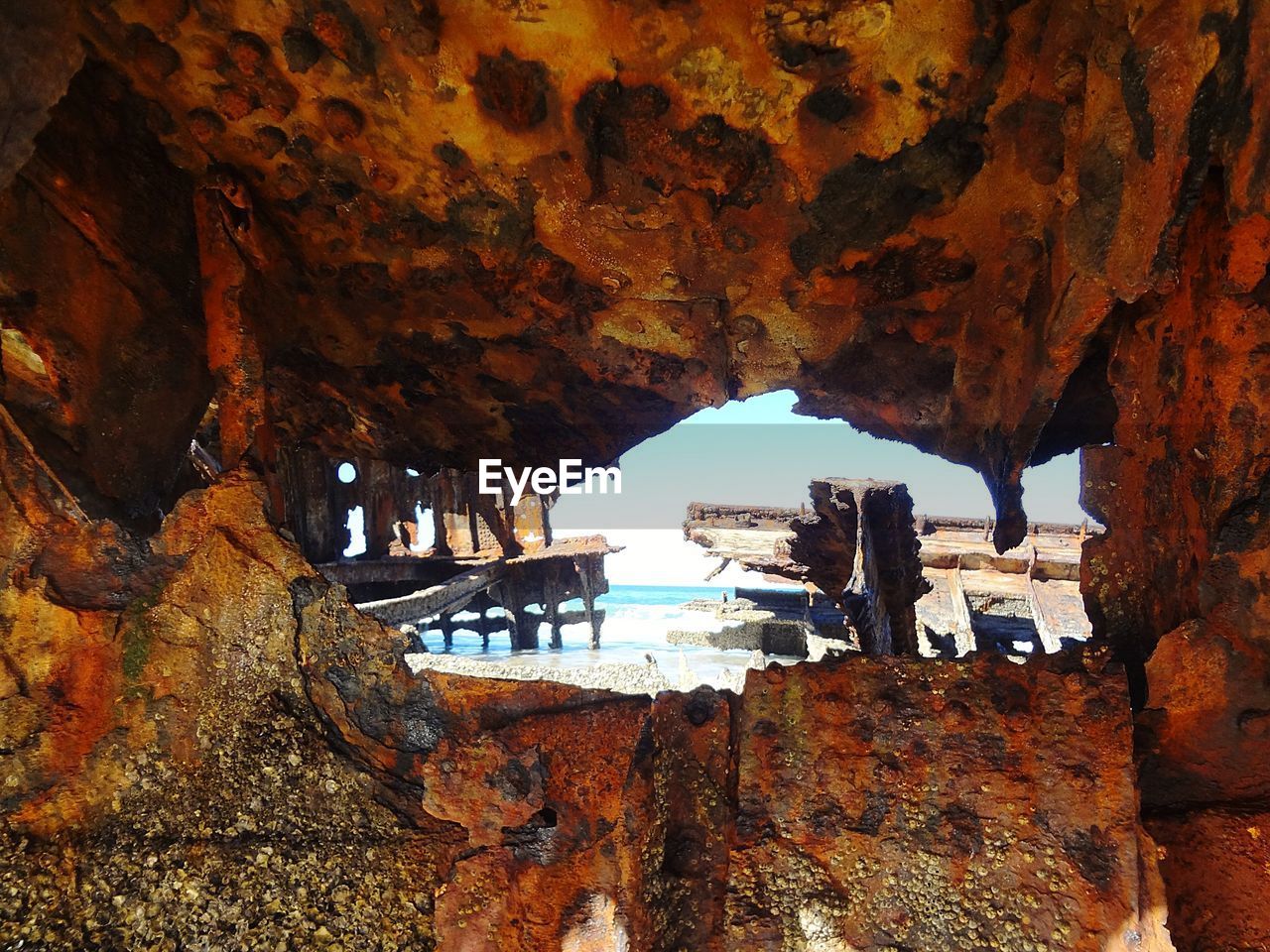 VIEW OF ROCKS IN WATER