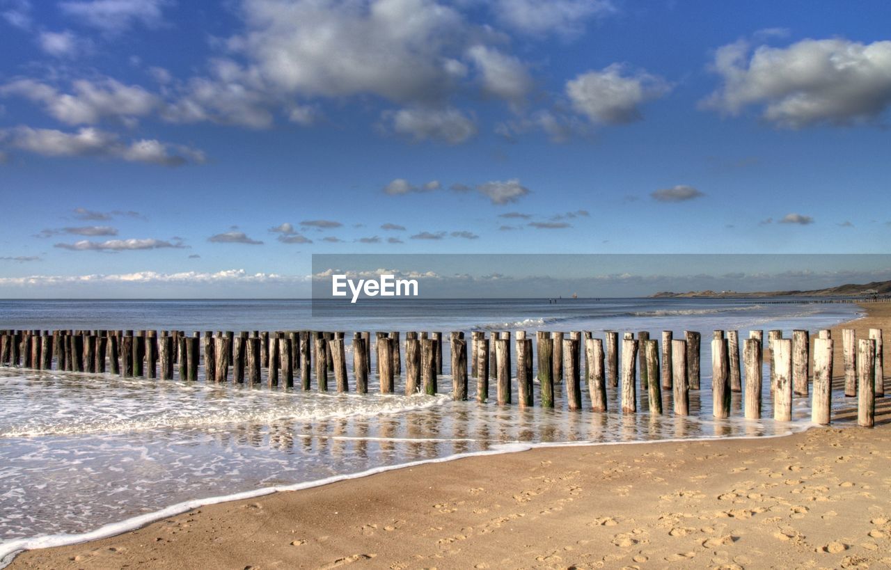 Scenic view of beach against sky