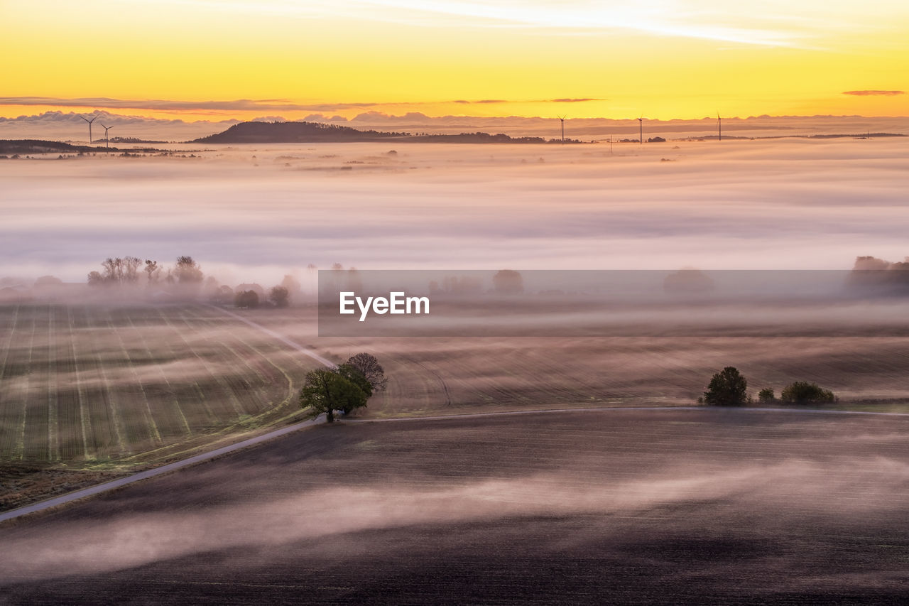Sunrise with fog in the landscape
