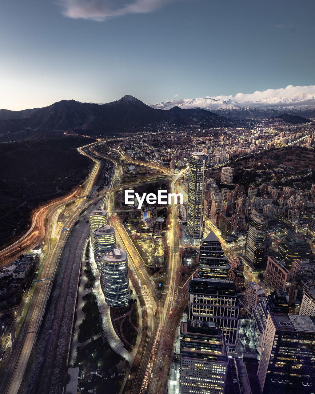 high angle view of illuminated cityscape against sky