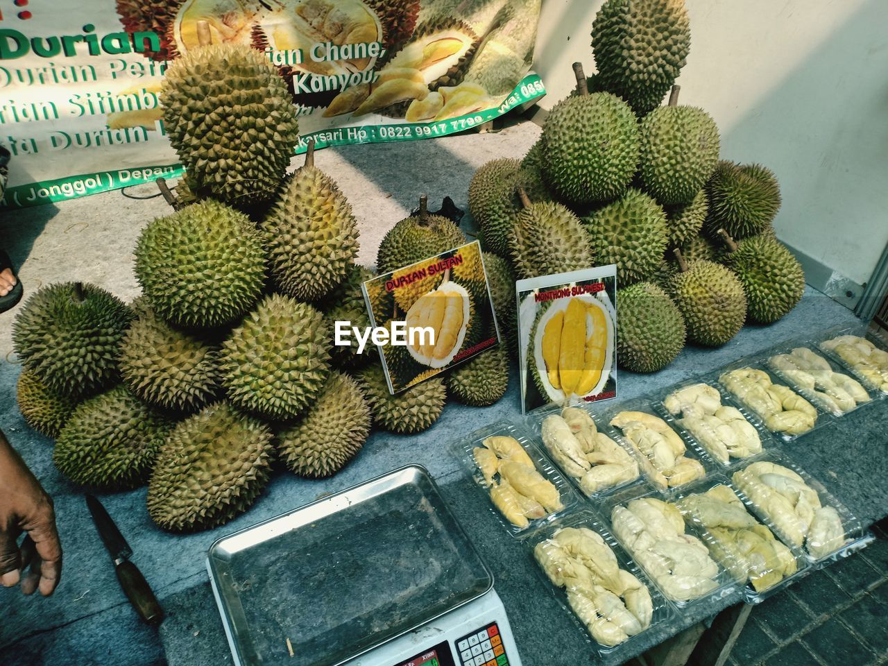 HIGH ANGLE VIEW OF FRUITS FOR SALE IN MARKET STALL