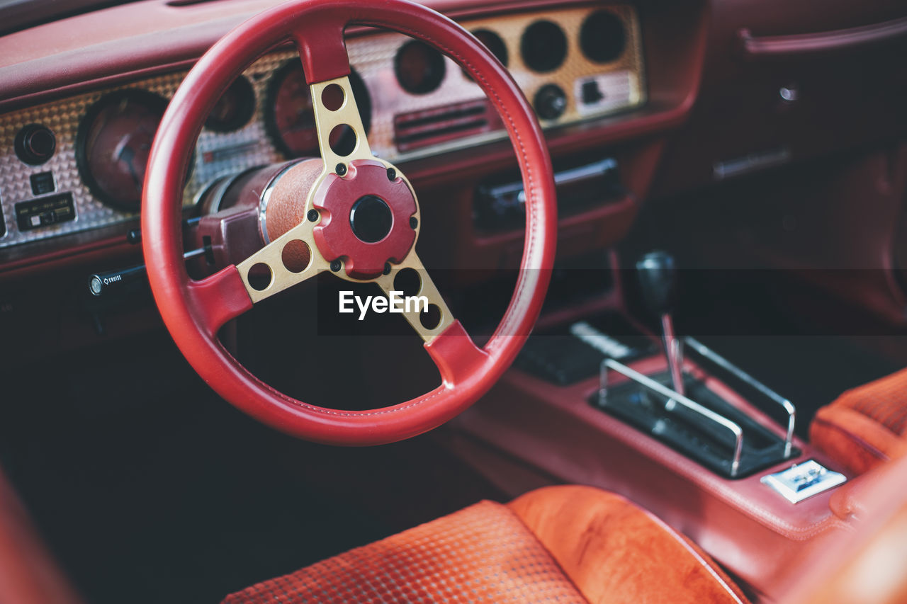 Close-up of steering wheel in vintage car